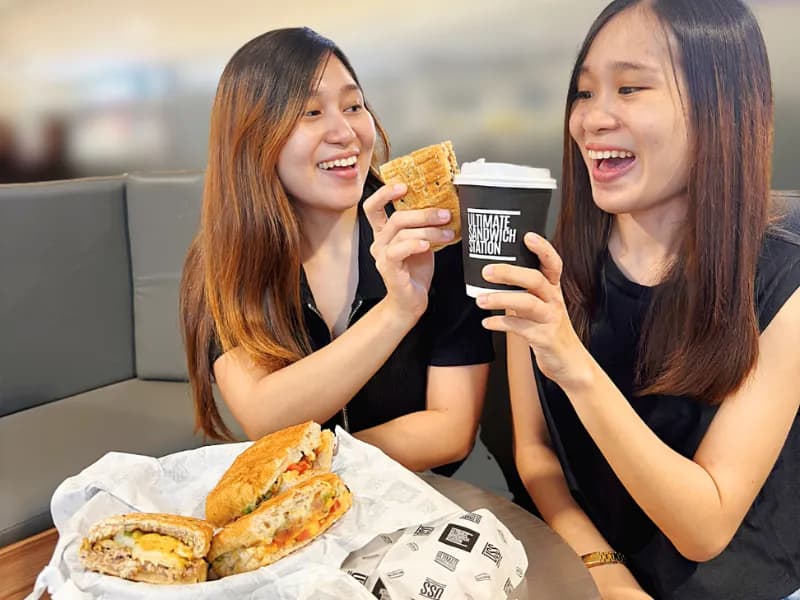 Happy customer at the kiosk